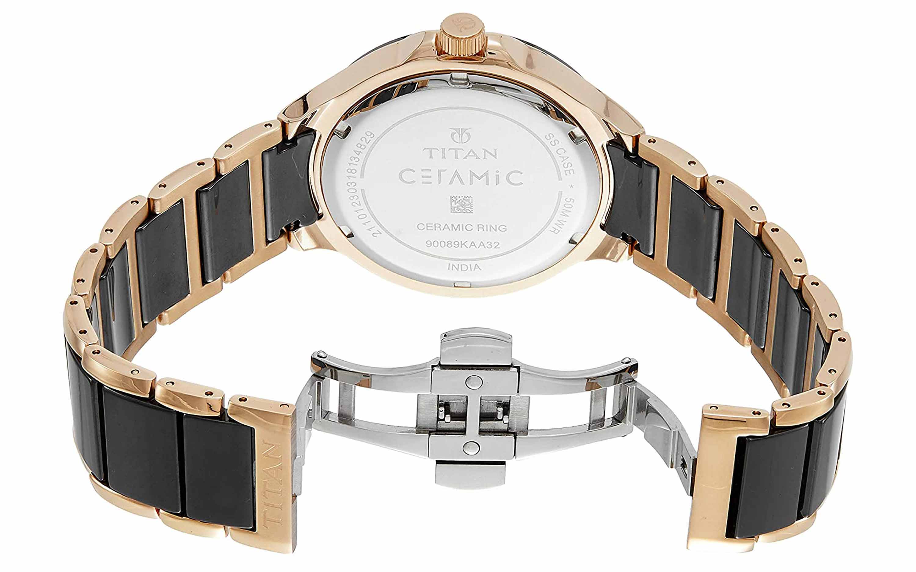 TITAN Men Metal Analog Watch [NE9317YM01A] in Vadodara at best price by The  Golden Time - Justdial